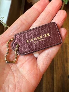 ♥️💖 Coach Large Vintage Metallic Birgundy Hang Tag & Gold Ball Chain
